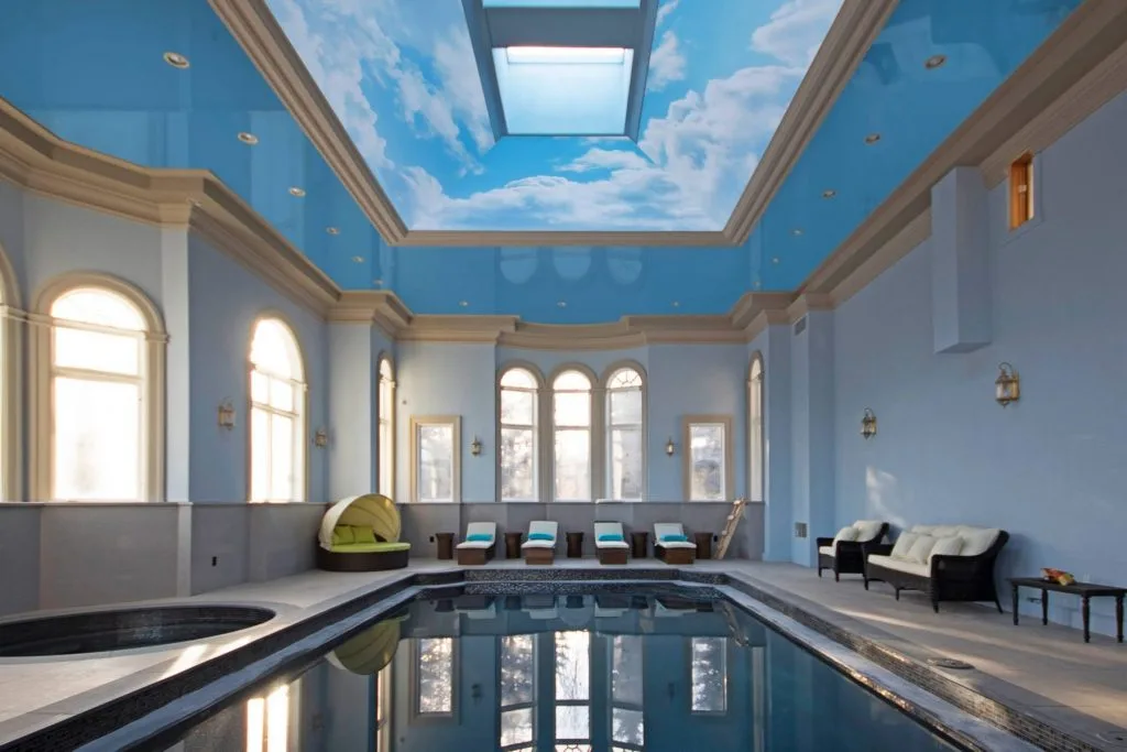amazing sky printed ceiling in swimming pool by laqfoil