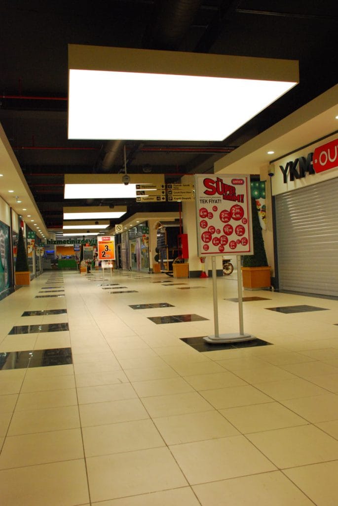 custom shopping hallway with back lit modular structures