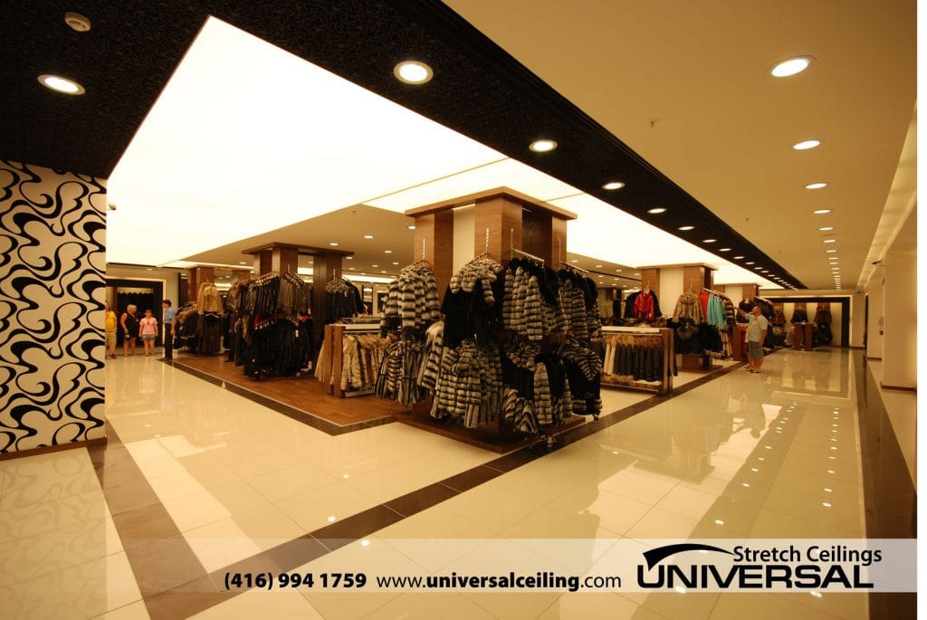 shopping department with black reflective stretch ceiling and back lit ceiling