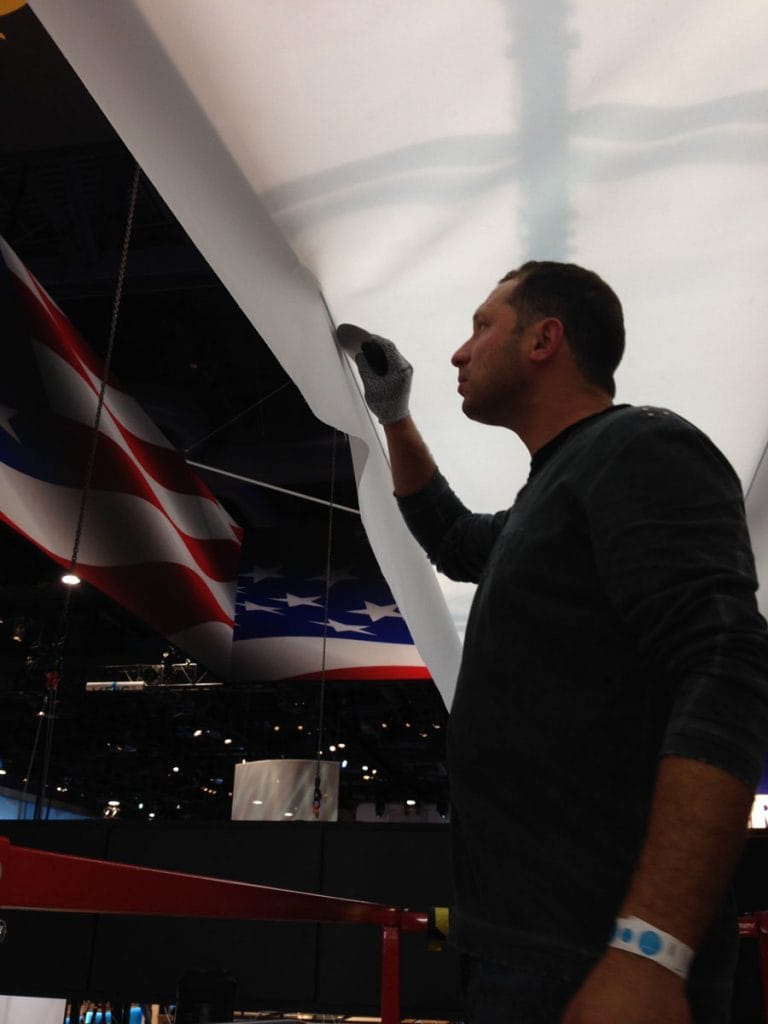 laqfoil team installing custom stretch ceiling