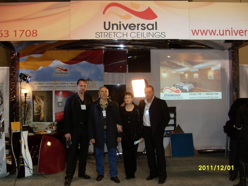 laqfoil team in-front of stretch ceiling bot